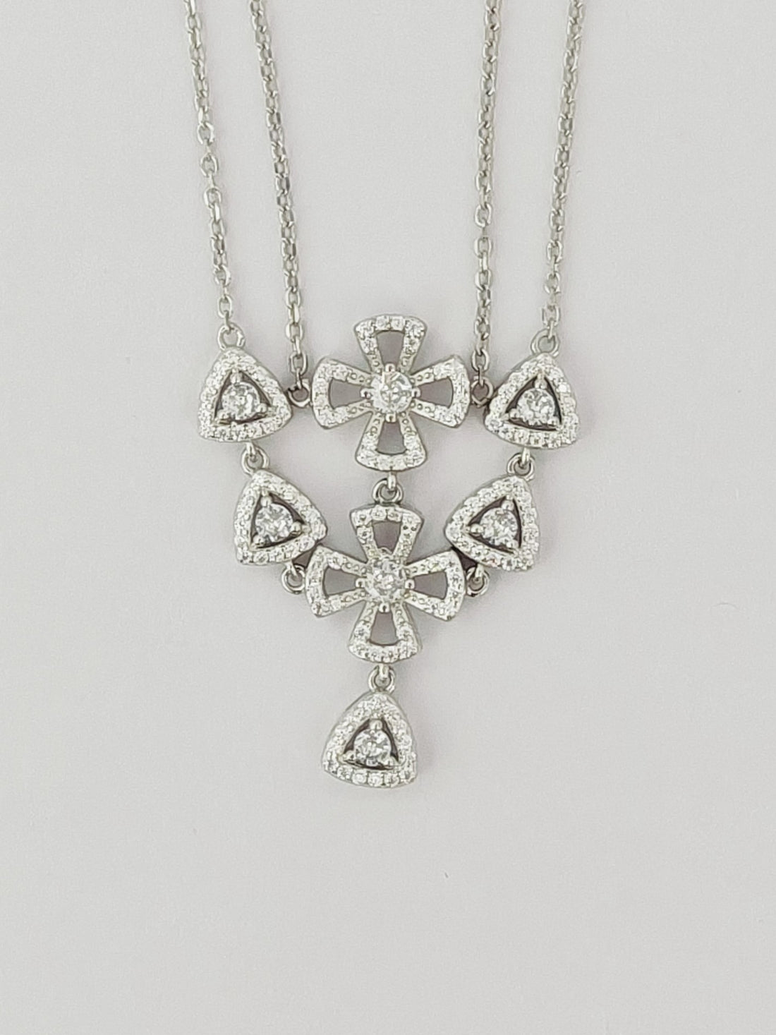 Diamond necklace with a gray background
