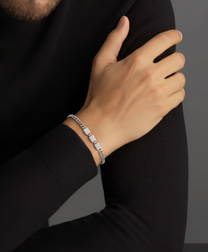Person wearing a bracelet with a dark background
