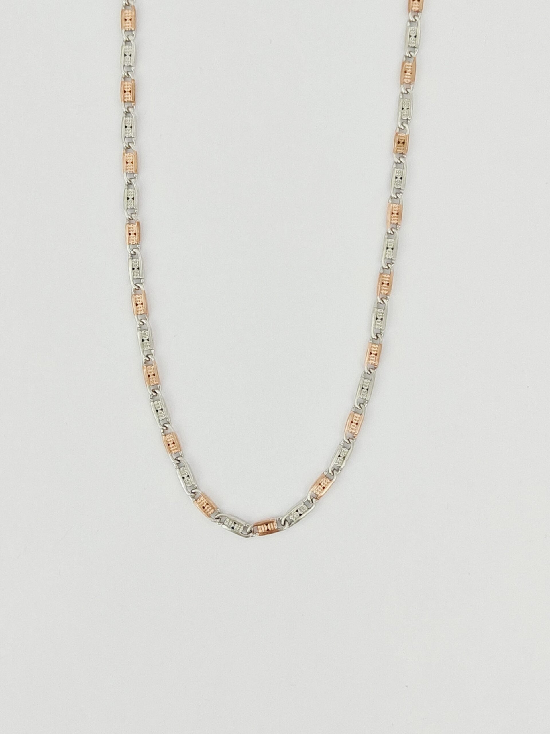 Necklace with multicolored beads on a light gray background