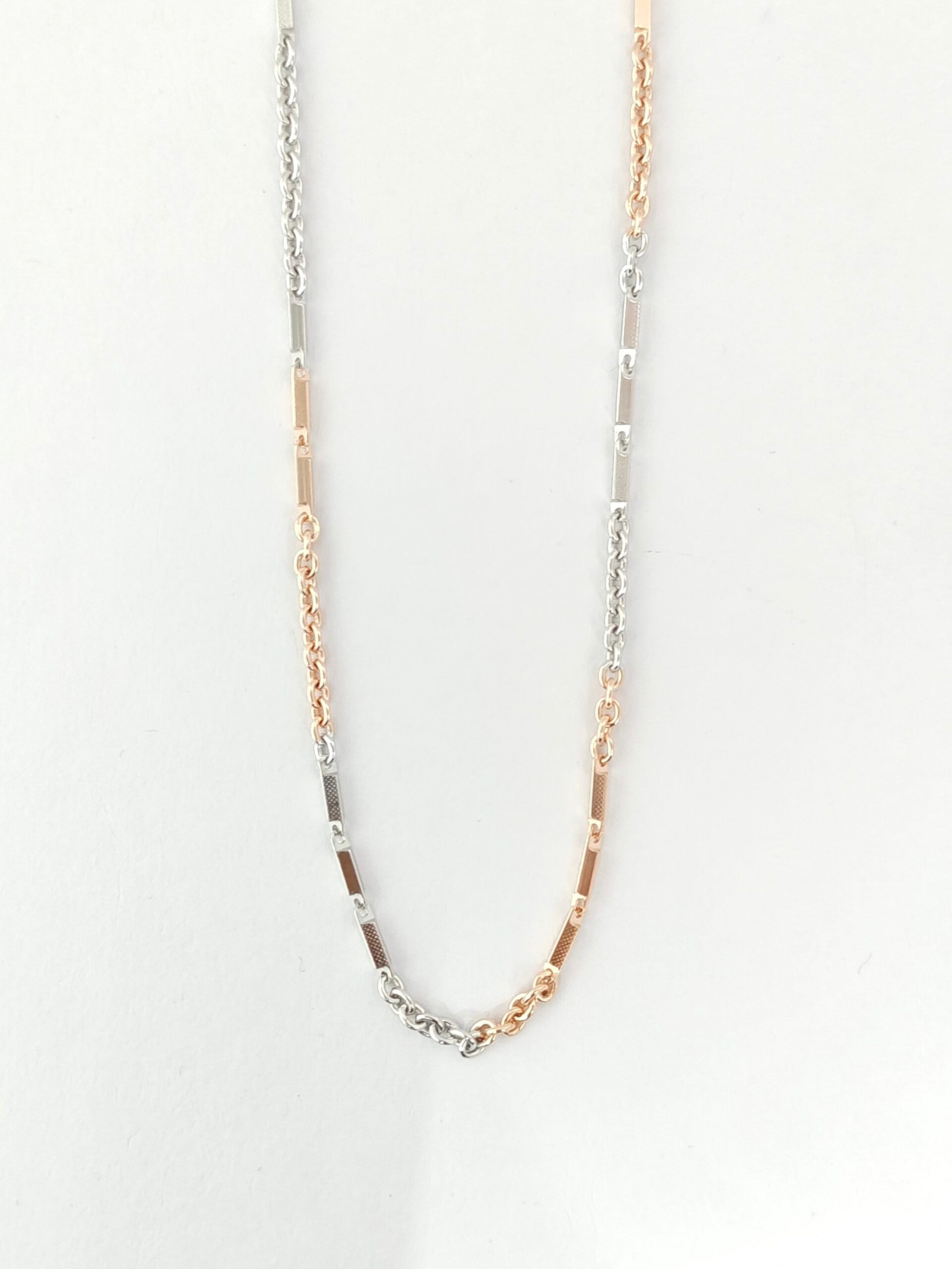 Necklace with multicolored beads on a white background