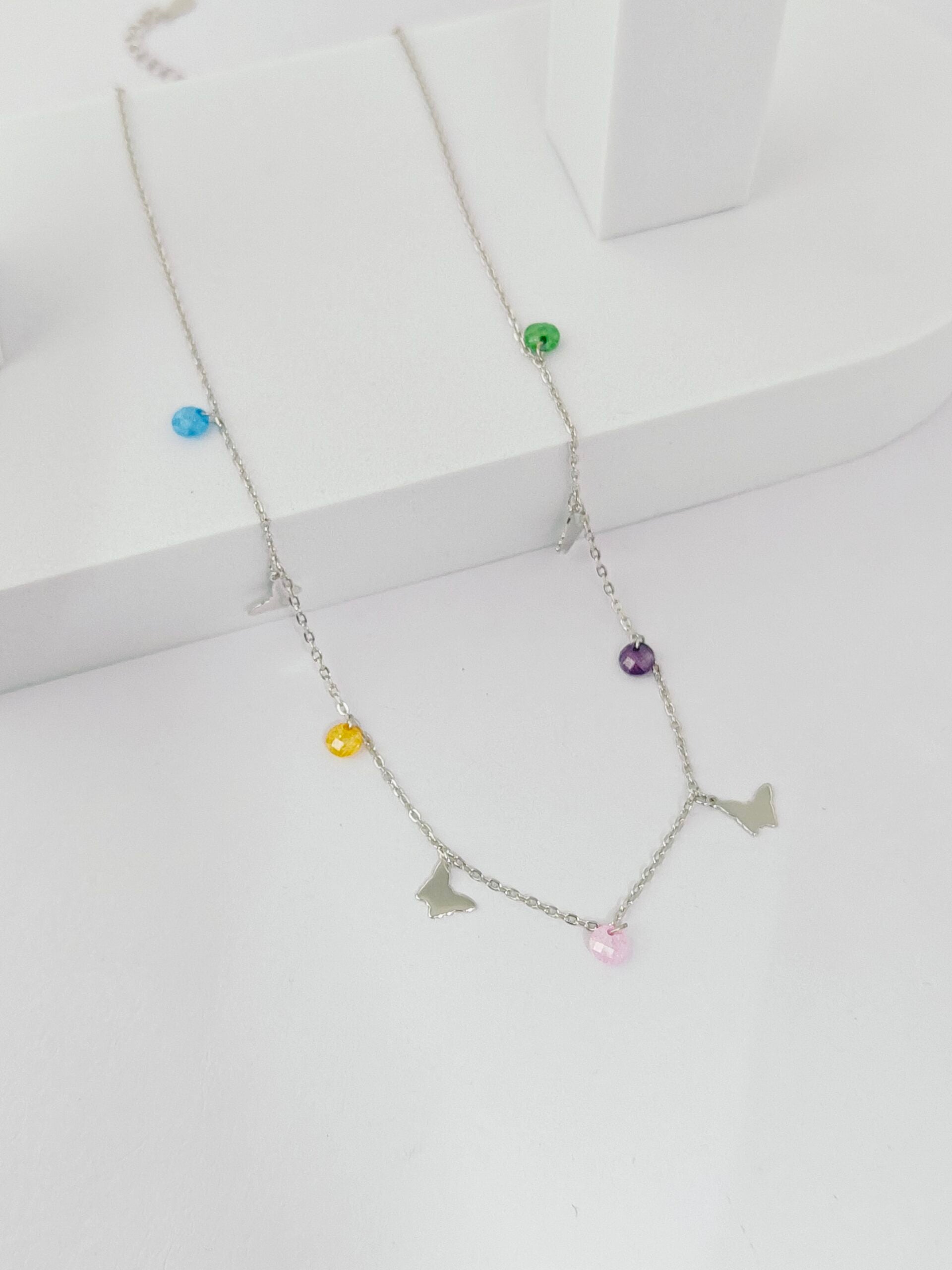 Necklace with colorful beads on a white background