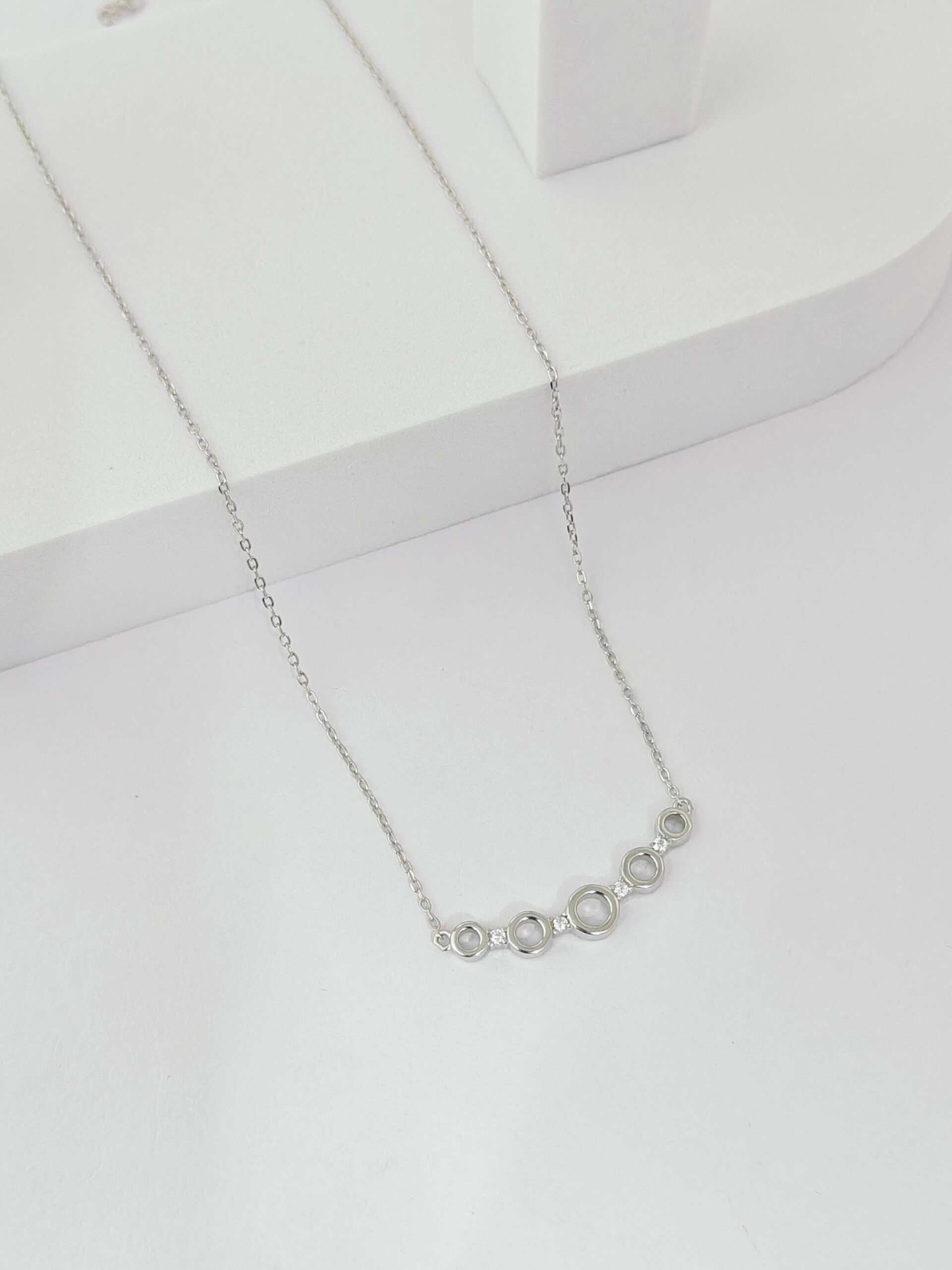 Silver necklace on a white background