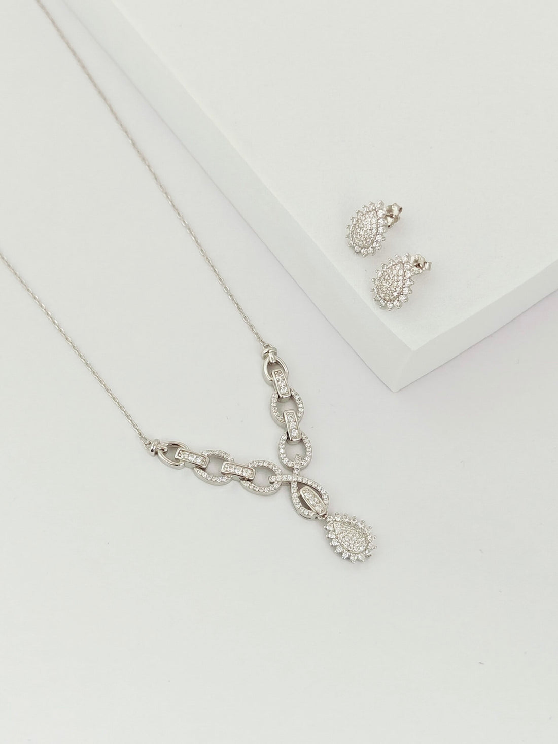 Oval Accents With Pear Diamond Pendant Set