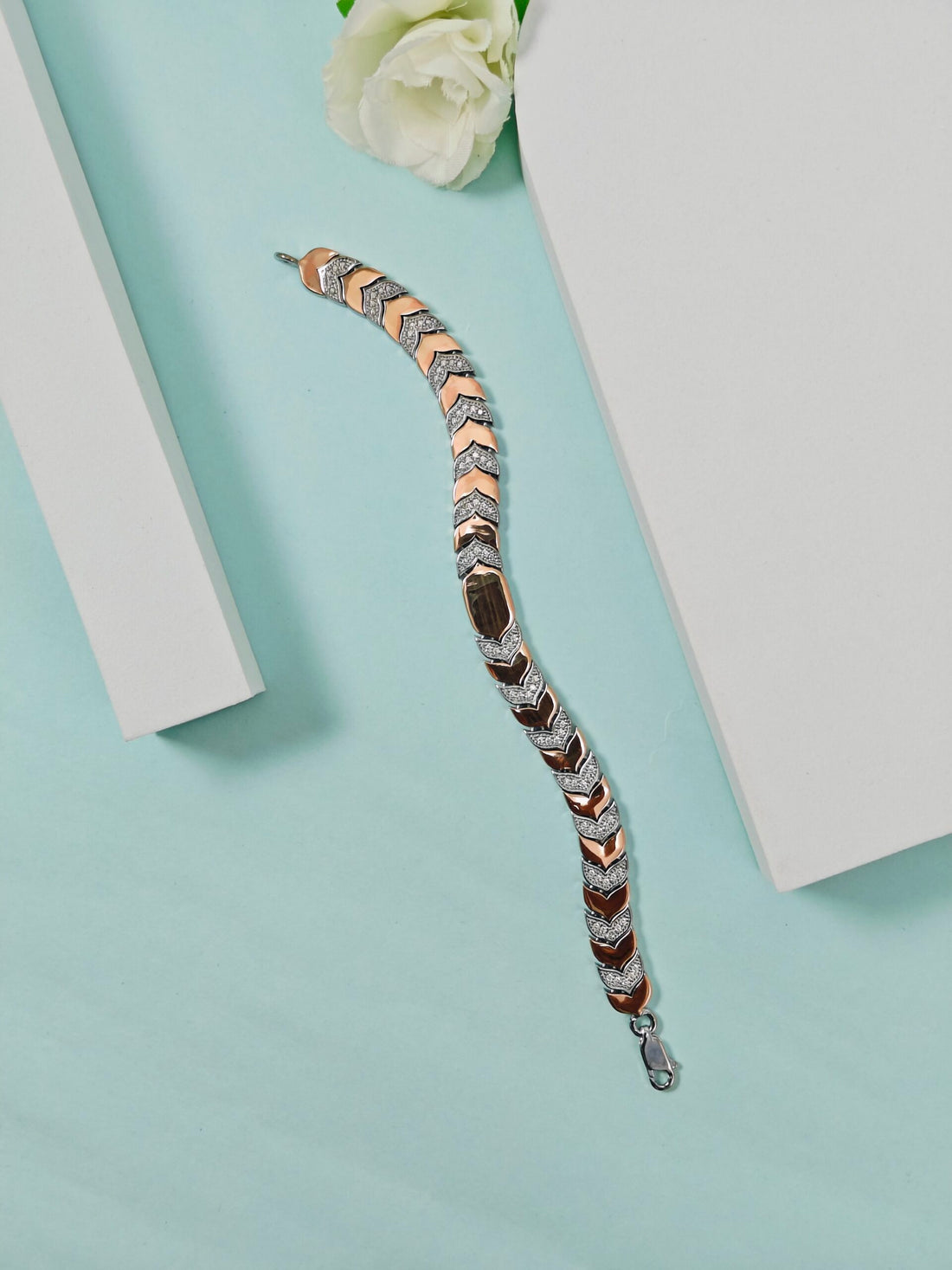 Bracelet with zigzag pattern on a light blue background