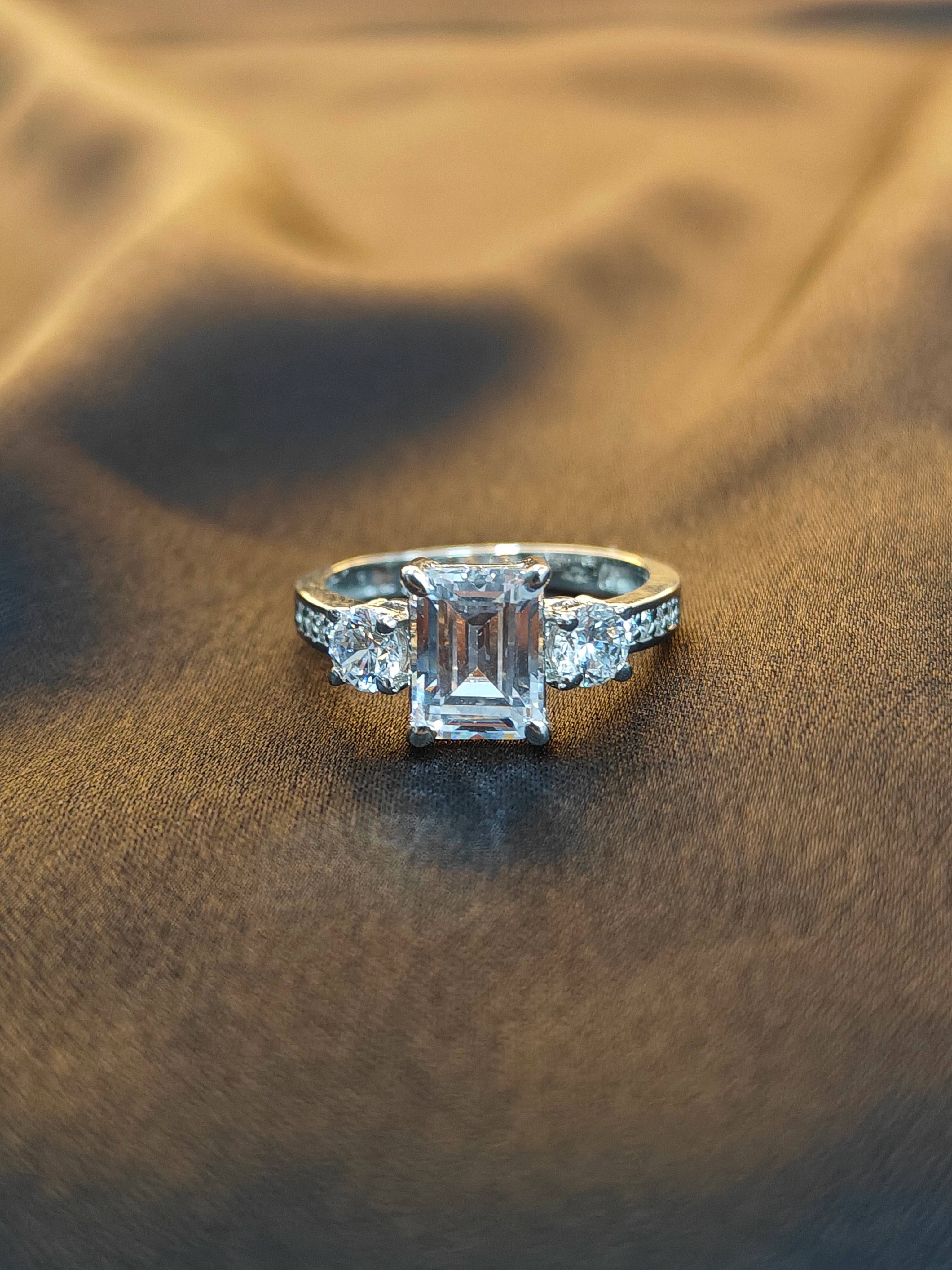 Diamond ring on a textured brown surface