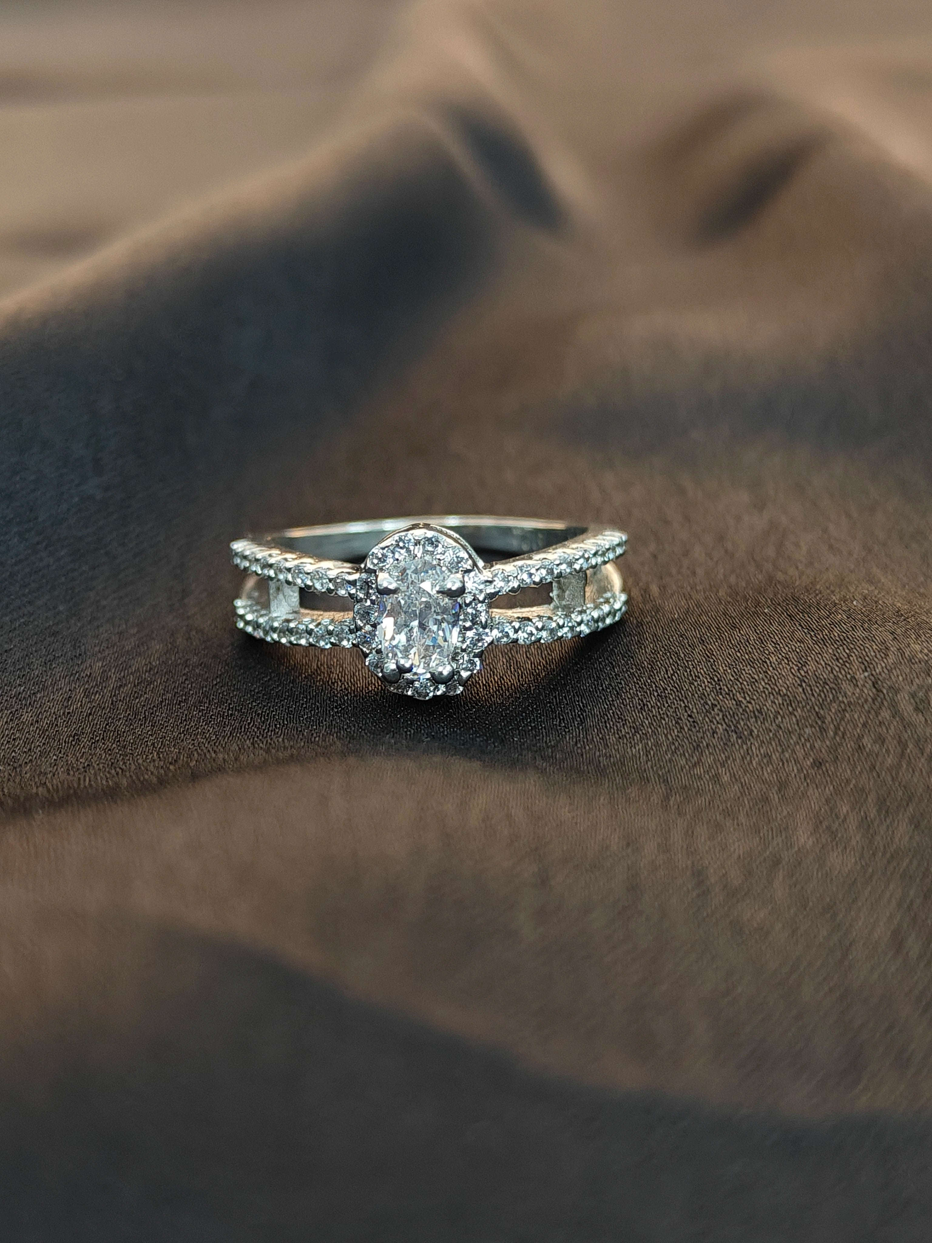 Diamond ring on a textured brown surface