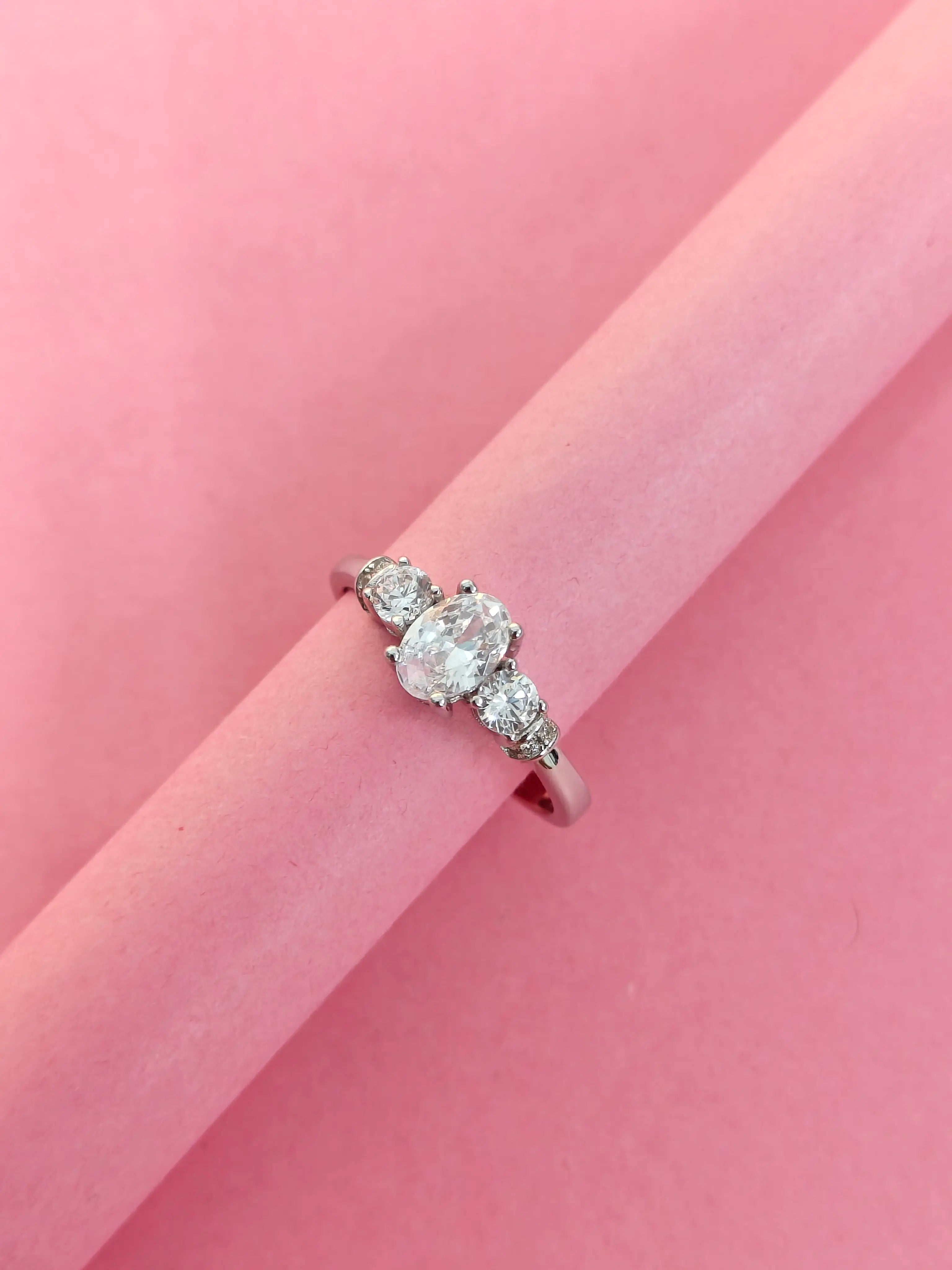 Diamond ring on a pink background