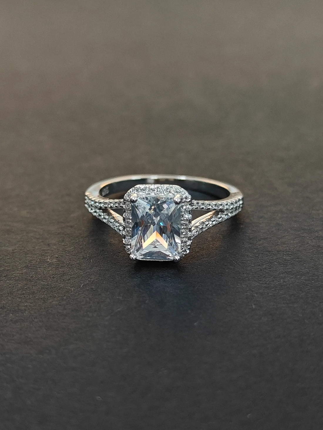 Diamond ring with a dark background