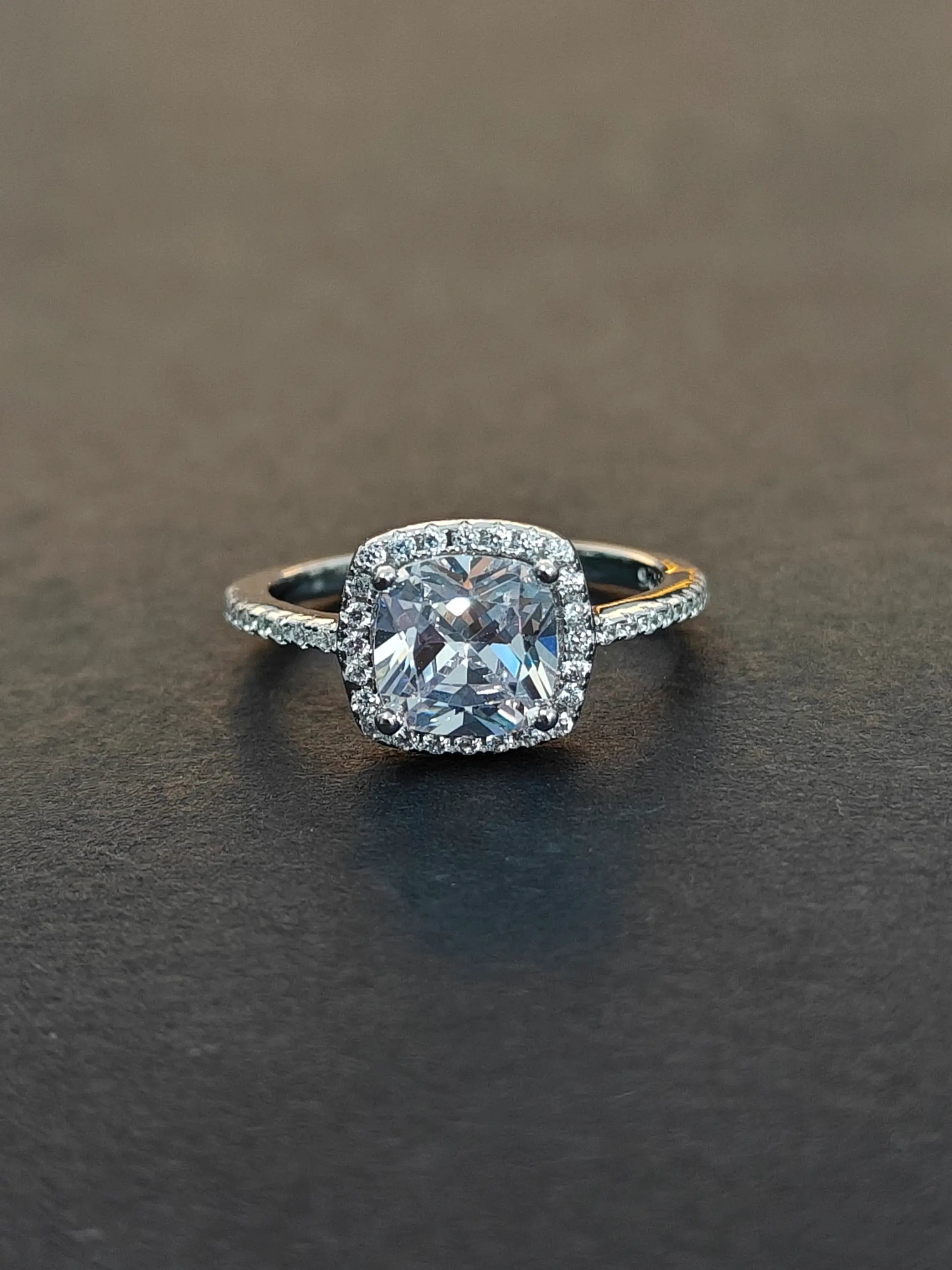 Diamond ring with a dark background