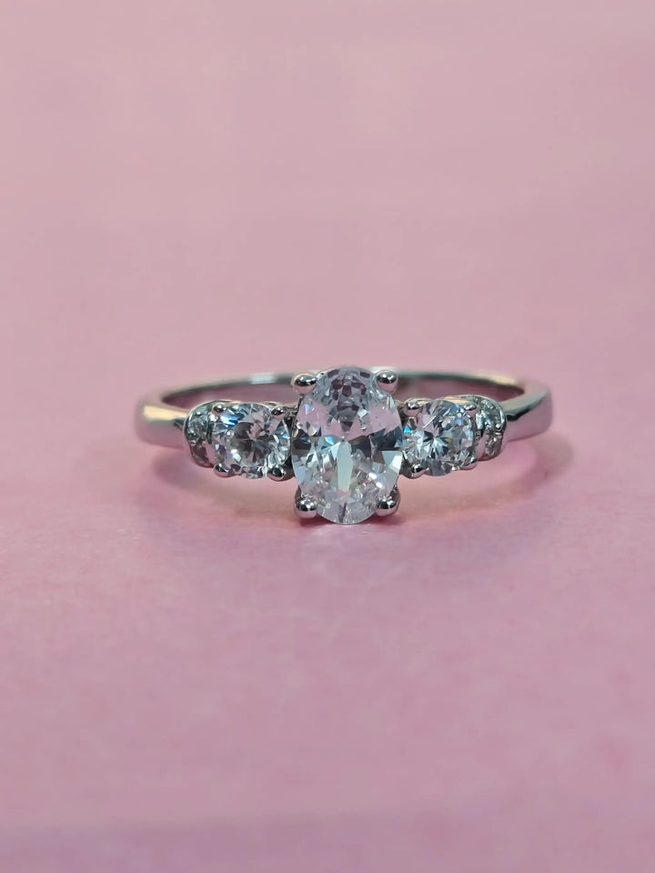 Diamond ring with a pink background