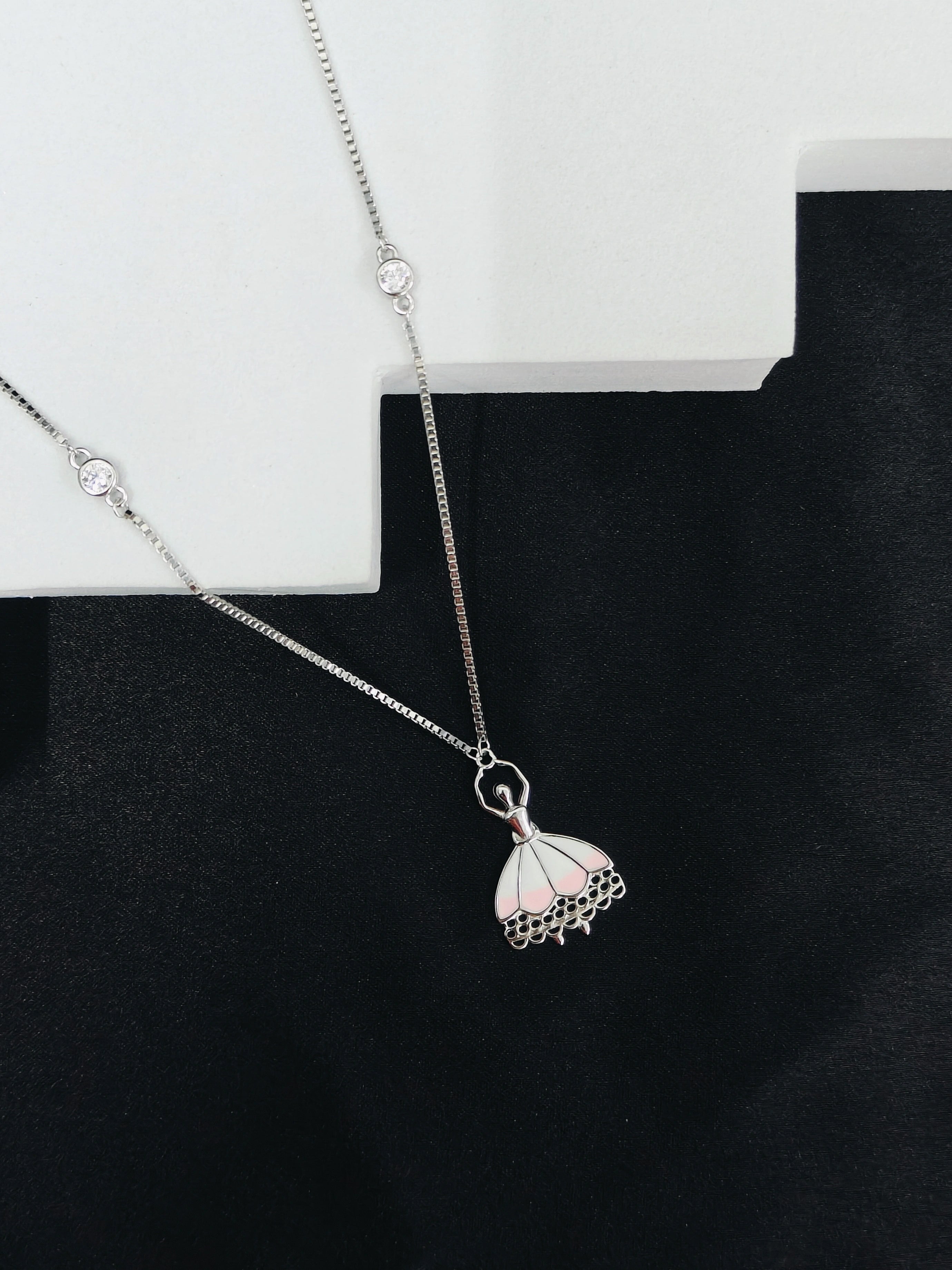 Necklace with a pendant on a black and white background
